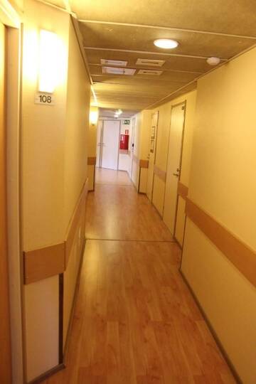 Фото номера Стандартный трехместный номер с сауной Отель Aapiskukko Hotel г. Пялькяне 8